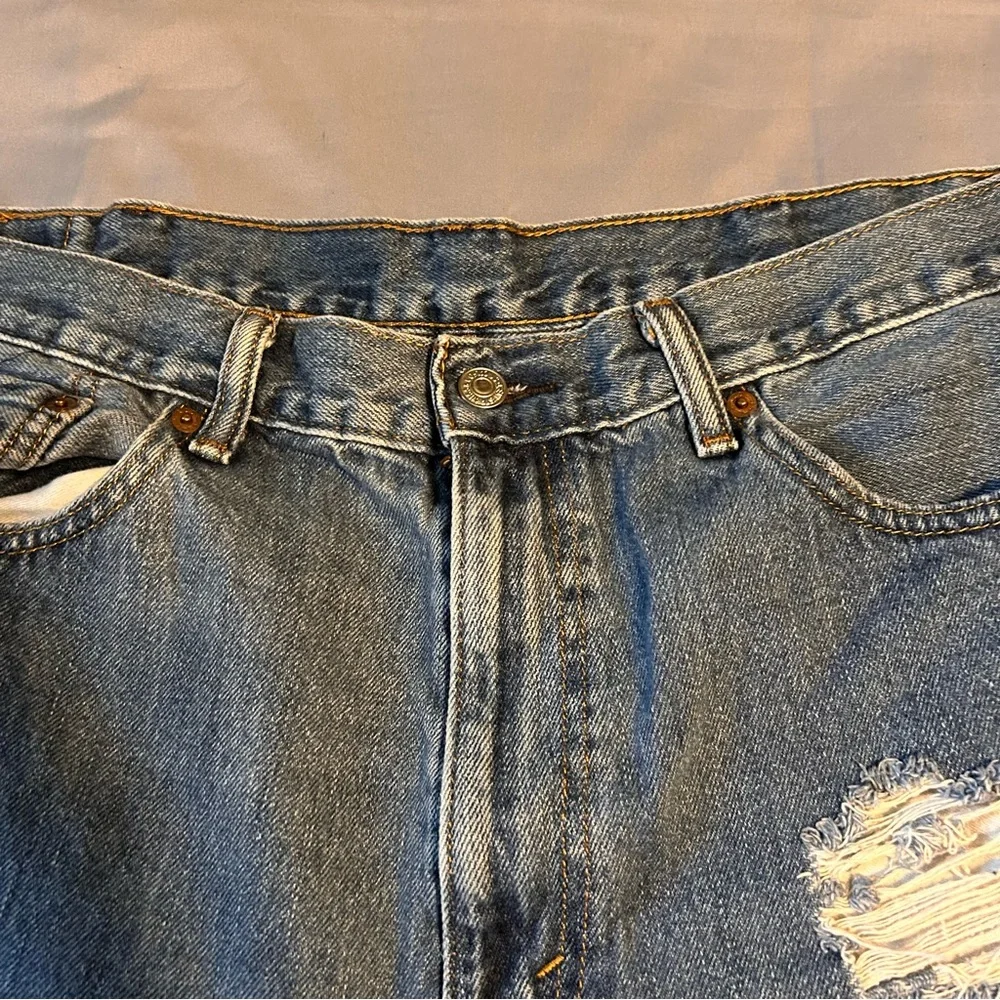 Levi’s 505 Distressed Jean Shorts